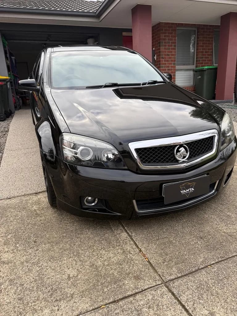Detailed black Holden Caprice running a Vanta number-plate frame